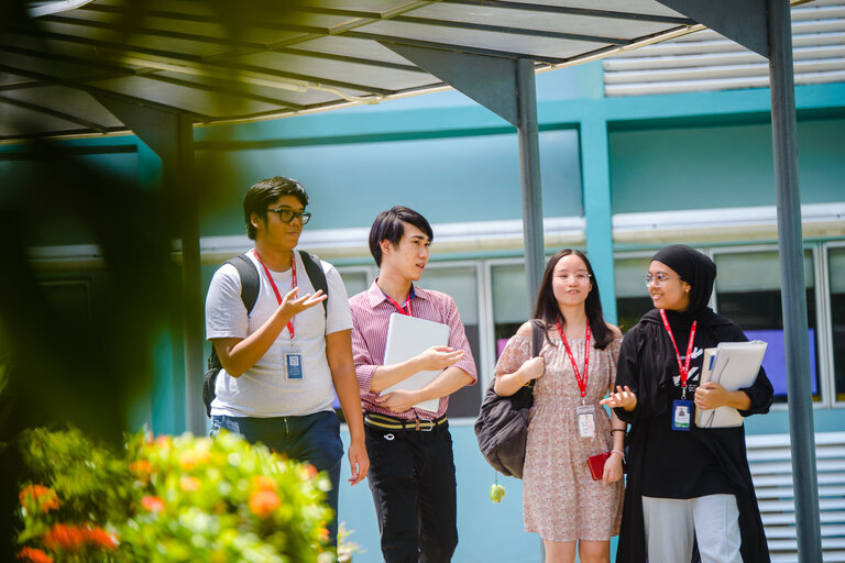 Students talking together while walking