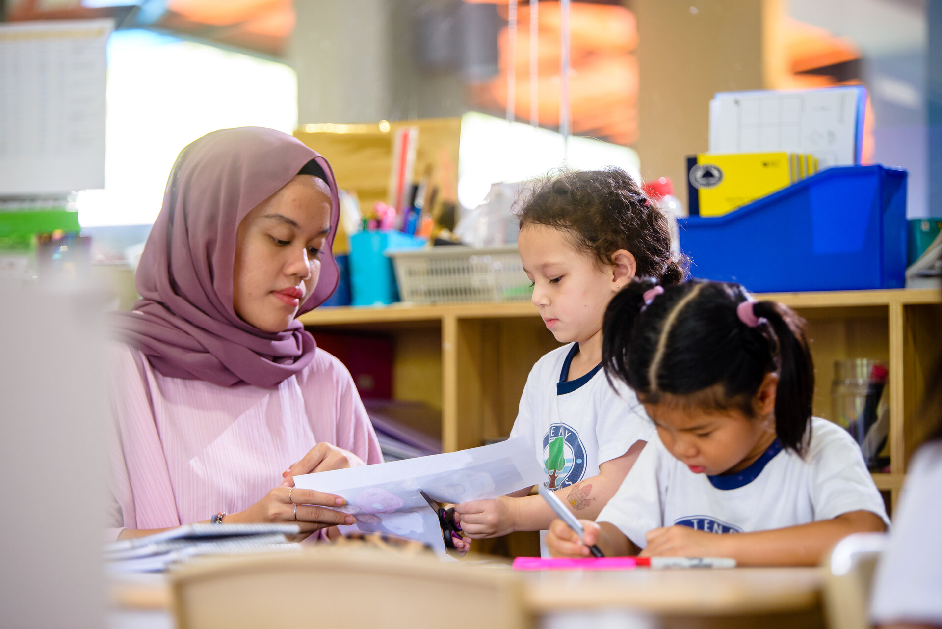 Kindergarten students with their teacher
