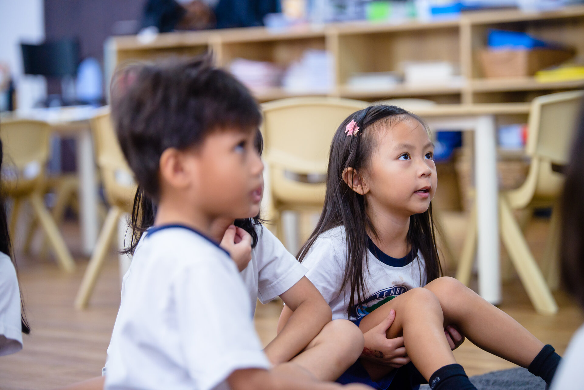 Kindergarten students listening to something