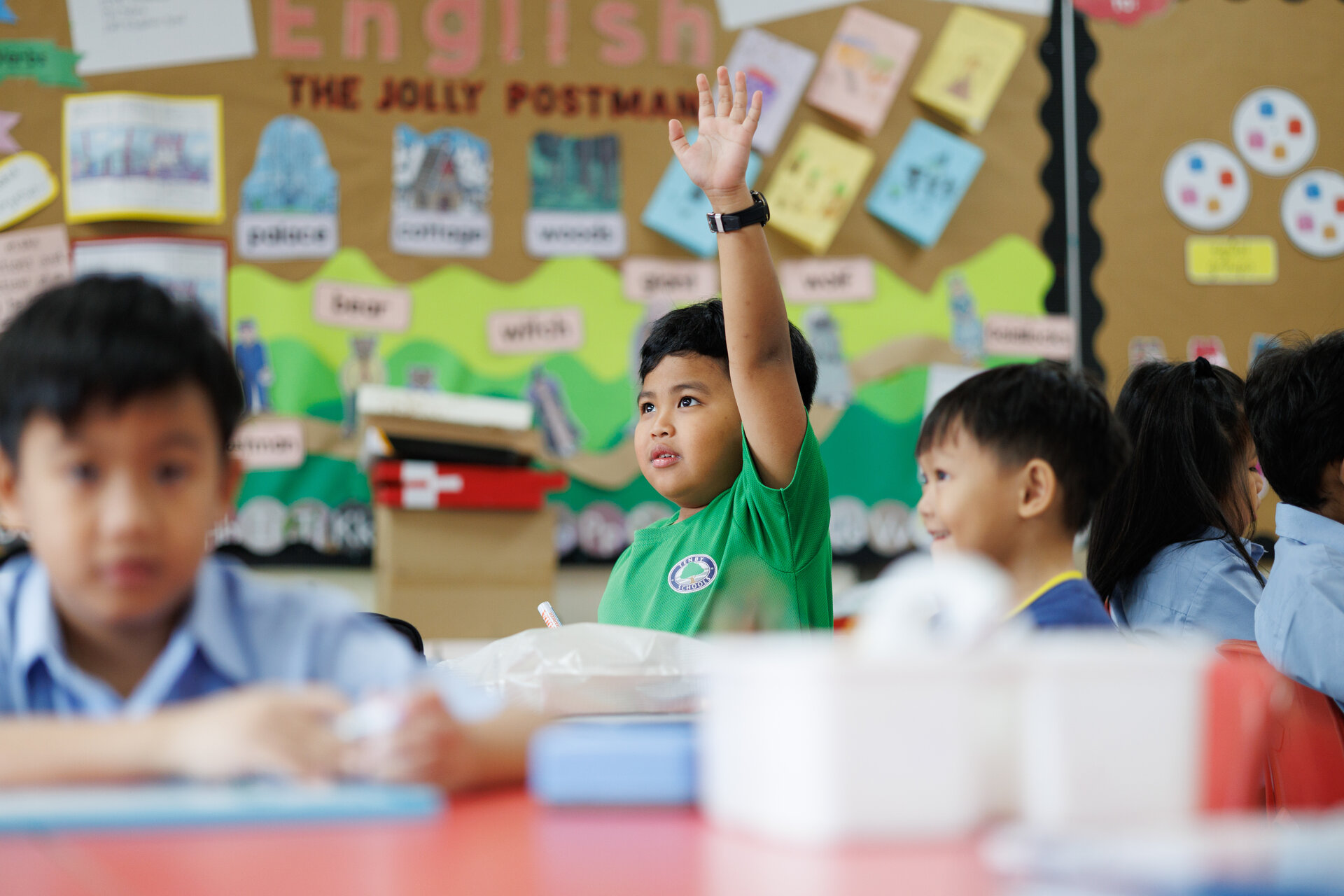 Tenby Schools student raising his hand 