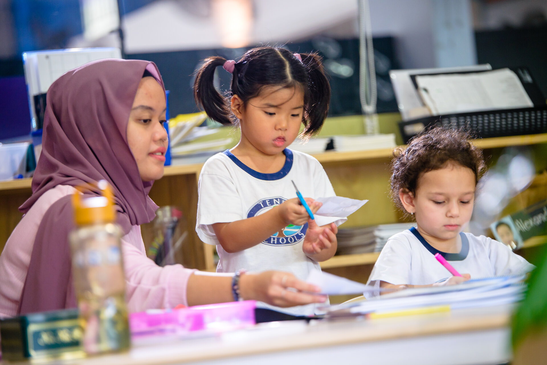 Tenby Schools teacher helping her students